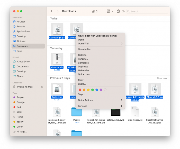 Screenshot of removing useless files from Download folder on macOS.
