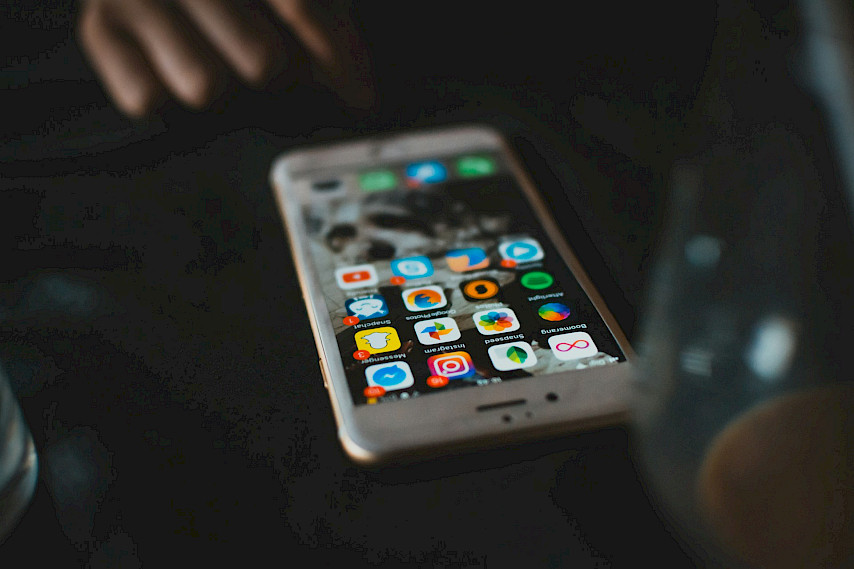 iPhone laying on a table.