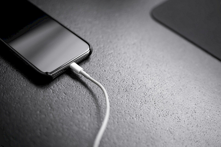 Charging an iPhone.